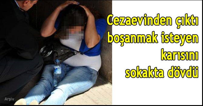 Eşini sokak ortasında dövdü