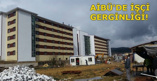 AİBÜ'DE İŞÇİLER ÇATIYA ÇIKIP EYLEM YAPTI!