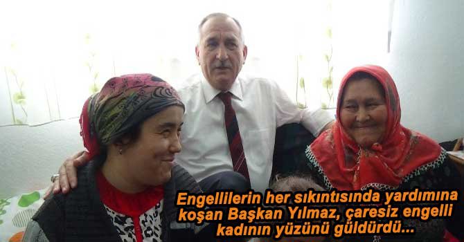 BAŞKAN YILMAZ'DAN ENGELLİ KADINA EV...