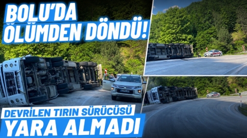 BOLU'DA ÖLÜMDEN DÖNDÜ! DEVRİLEN TIRIN SÜRÜCÜSÜ YARA ALMADI